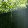 Clôture avec haie artificielle en rouleau